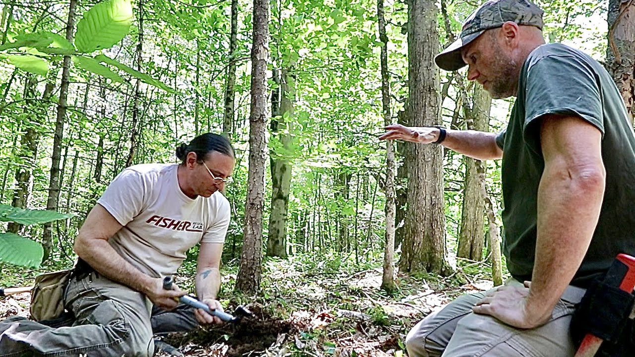 Using our metal detectors to find a cabin site on the 1892 map in NH