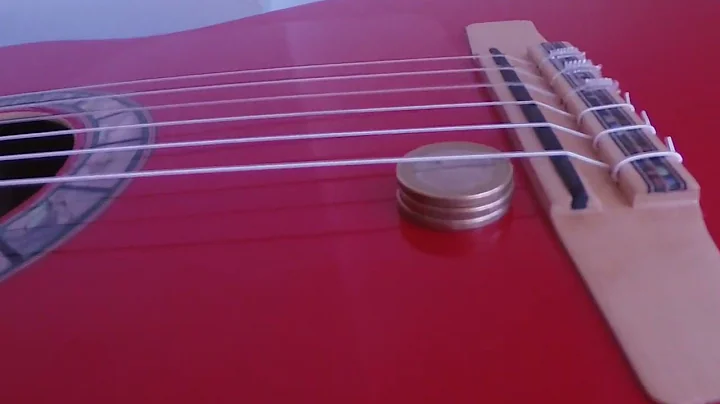 What is real low action in Flamenco guitars? Best of the year/Test your bridge w coins/Andalusian AG