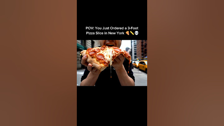 POV : Vous venez de commander une part de pizza de 90 cm à New York 🍕📏💀 #shorts #ai #pizza #veo3 ...