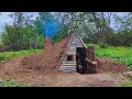 Ultimate bushcraft earth hut complete survival shelter  clay fireplace construction warmth