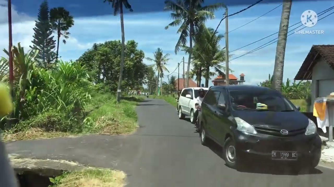 Driving on a narrow road in Bali, Indonesia