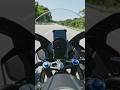 Magnetic phone mount attached to car dashboard, phone stable, travel road background