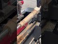 Automatic feeding CNC woodworking lathes are used to turn, mill, and sand solid wood table legs.