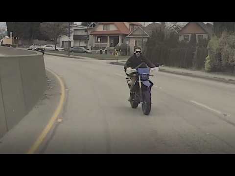 Motorcycle Goes the Wrong Way!