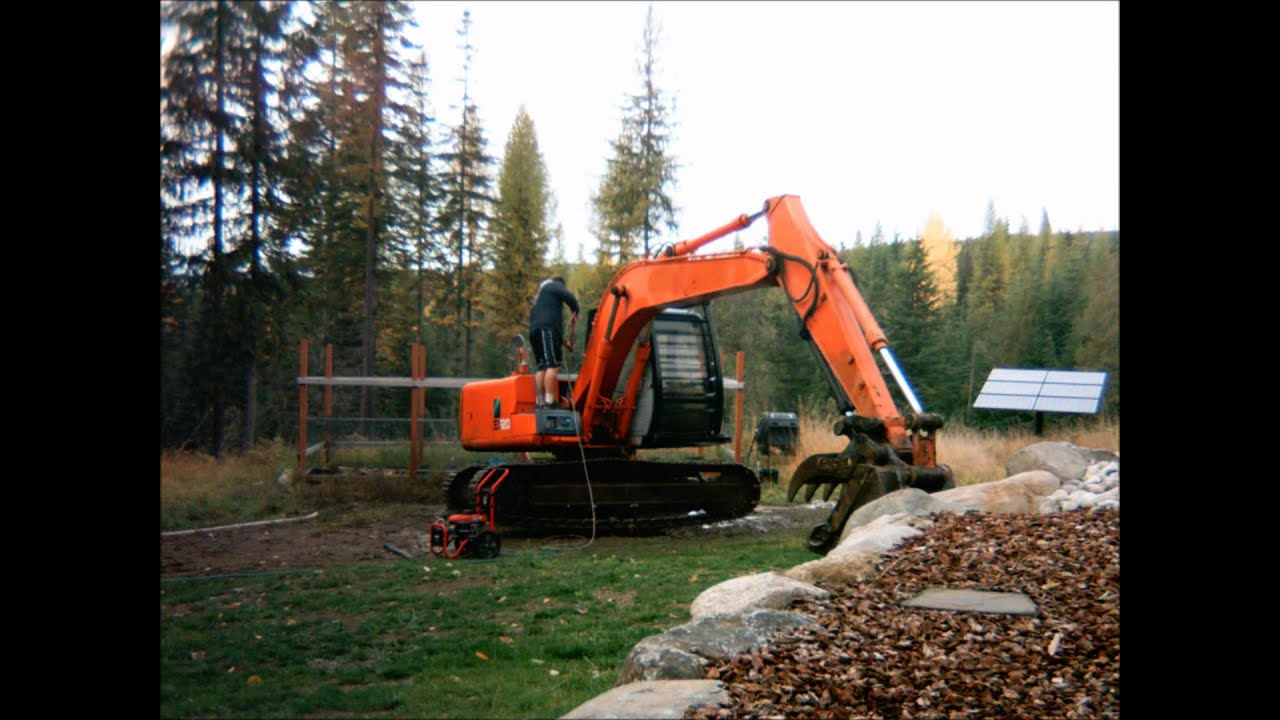 Cleaning a Hitachi excavator in under 20 seconds.