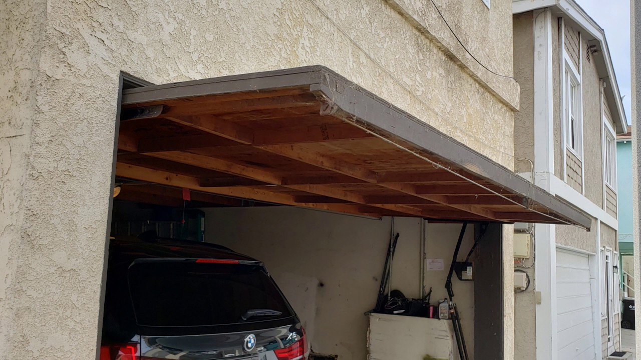 Replacing A One Piece Garage Door With A Sectional Garage Door Youtube