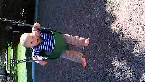 Baby swings for the first time