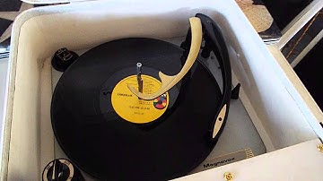 Magnavox record player playing a 33 RPM record.