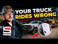 Stock vs Liquid Springs: Which Tows Smoother?