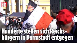 Kaiserreich mitten in Darmstadt: Reichsbürger-Treffen auf dem Carolinaplatz! Hunderte protestieren!
