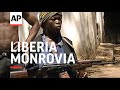 Liberia monrovia warring factions continue to fight