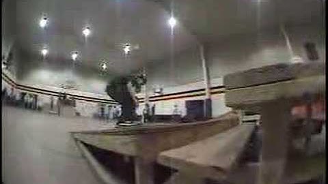 Rob Warren Nollie bigspin Heelflip over picnic table