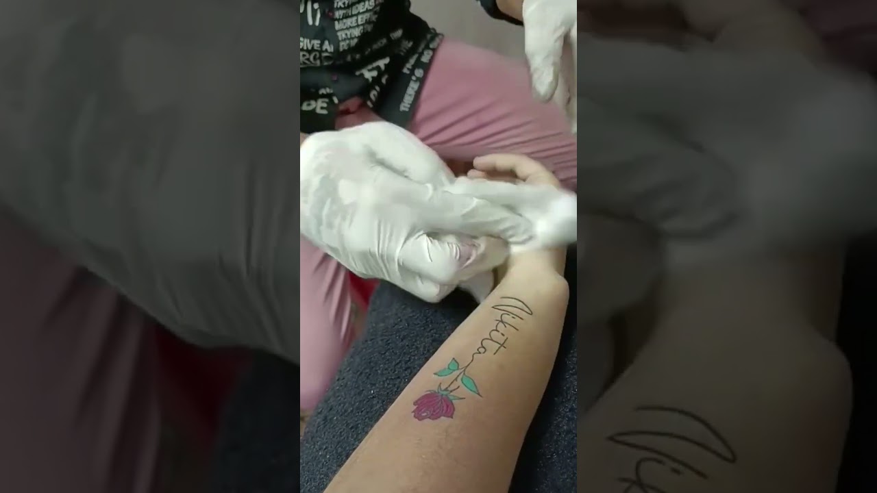 NIKITA WITH ROSE TATTOO 