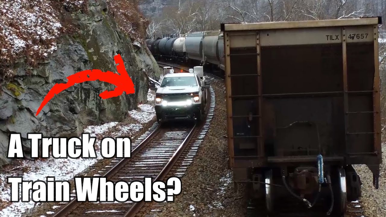 Highrailer! A Truck with Train Wheels? passes by a CSX Train! YouTube