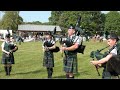 Huntly Pipe Band playing Braes of Killiecrankie during 2023 Oldmeldrum Highland Games in Scotland