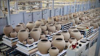 The process of mass production of traditional Korean pottery. Korean traditional pottery factory