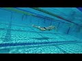 Kira Toussaint underwater kicking slowmo