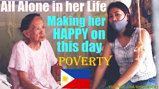 Life in the Philippines: A Poor Filipino Woman Who Lives All Alone in Life. Giving Help to the Poor