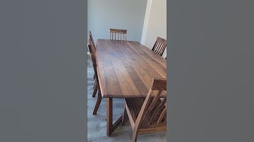 solid walnut dining table and chairs