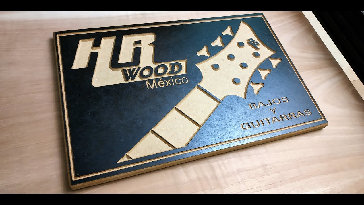 Grabado de MDF entintado con router CNC Engraving of inked MDF with