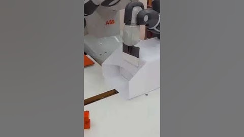 dual arms robot wraps gift #robot #ai