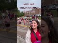 The News 8's sports team walks Moline's  homecoming parade