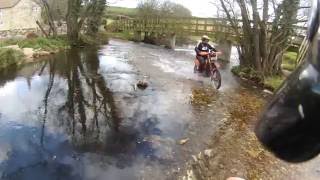 Fording the River Yarty near Axminster in Devon