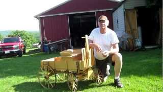 We love this hand-made miniature wagon (goat cart) so much that we