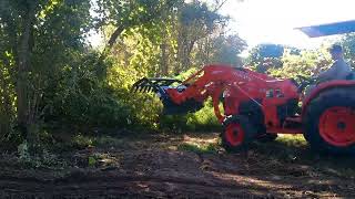 Another use for a grapple, (Tractor Work)