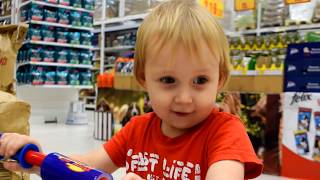 Race on Scooters and Indoor Playground for Children in Supermarket. Kids play by MAMA+