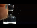 Slow motion of opening a singledose glass ampoule