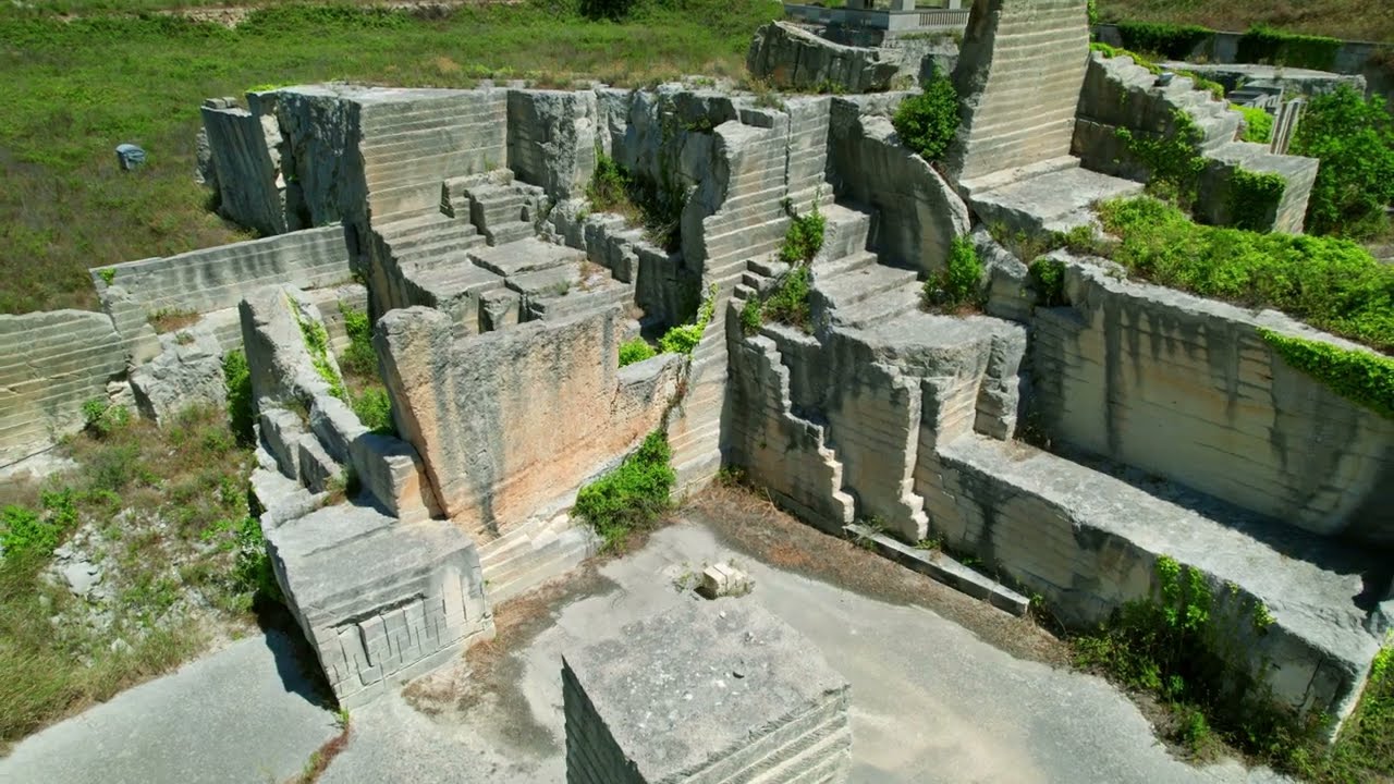 Abandoned "pietra leccese" limestone quarry from above | Cursi, Lecce, Salento, Italy | 4K drone