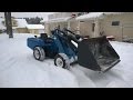 Home made wheel loader eating throught snow