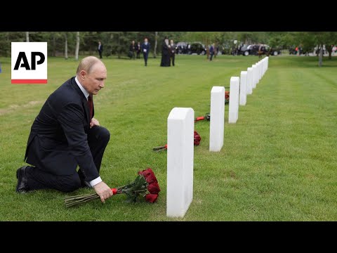 Putin lays flowers at graves for Soviet WWII pilots during Alaska visit