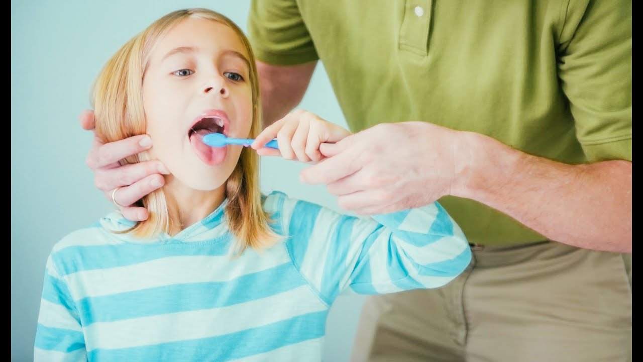 How to brush your child's teeth, ages 5-8