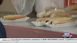 Bay St. Louis police, firefighters celebrate National Hot Dog Day with hot dog eating contest