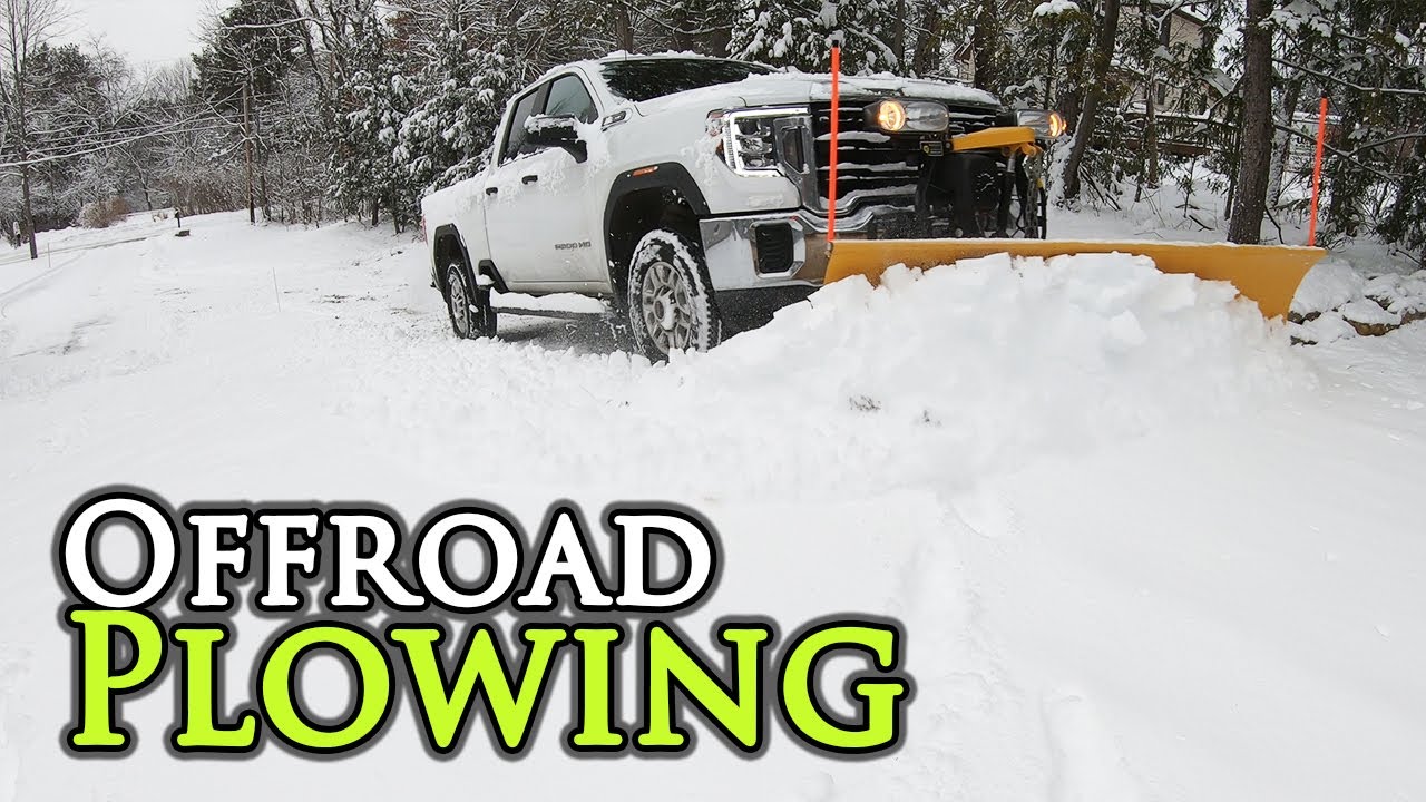 Snow Plowing with a GMC 2500 and BX23s YouTube