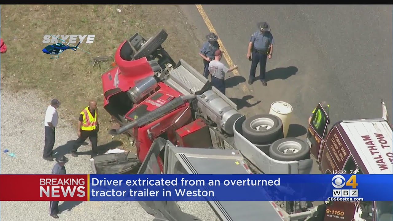 Driver hospitalized after tractor trailer tips over on ramp in Weston ...