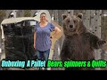 Unboxing a pallet with bears spinners and quilts the bear wants to see what is inside