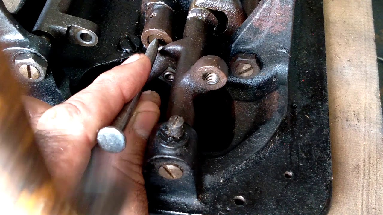 trocar tirar eixo oscilante do acionador da máquina de costura