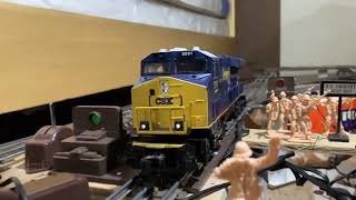I got four Trains Running.CSX Comes around 027 Track reversal Loop in Yard