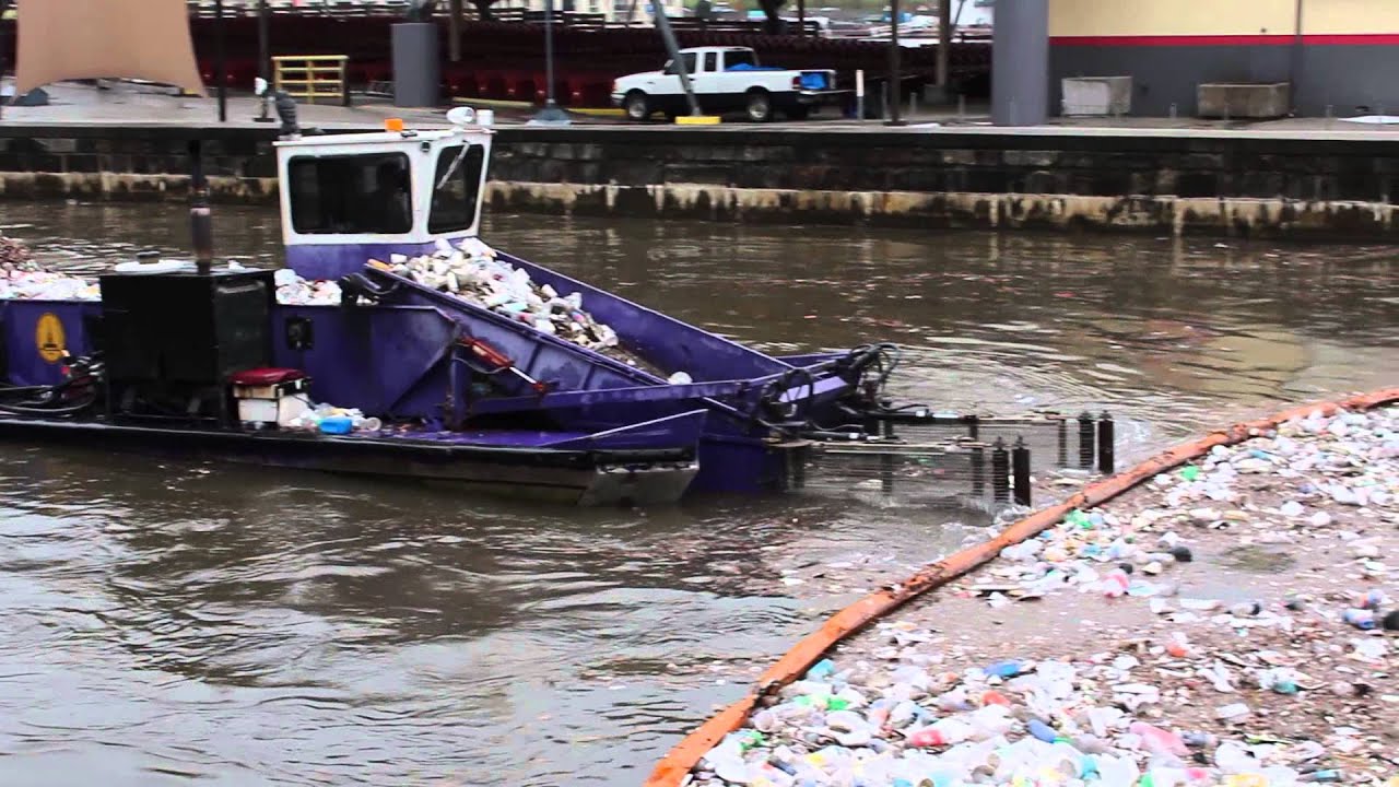 baltimore city trash skimmer boat in the inner harbor