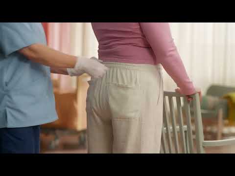 TENA ProSkin Flex Fitting Video - How to fasten at back while standing