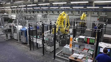 RIMA-SYSTEM Trimming, stacking, palletizing behind three rotogravure presses 073