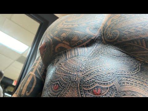 Video: Puas tattooists tattoo hla caws pliav?