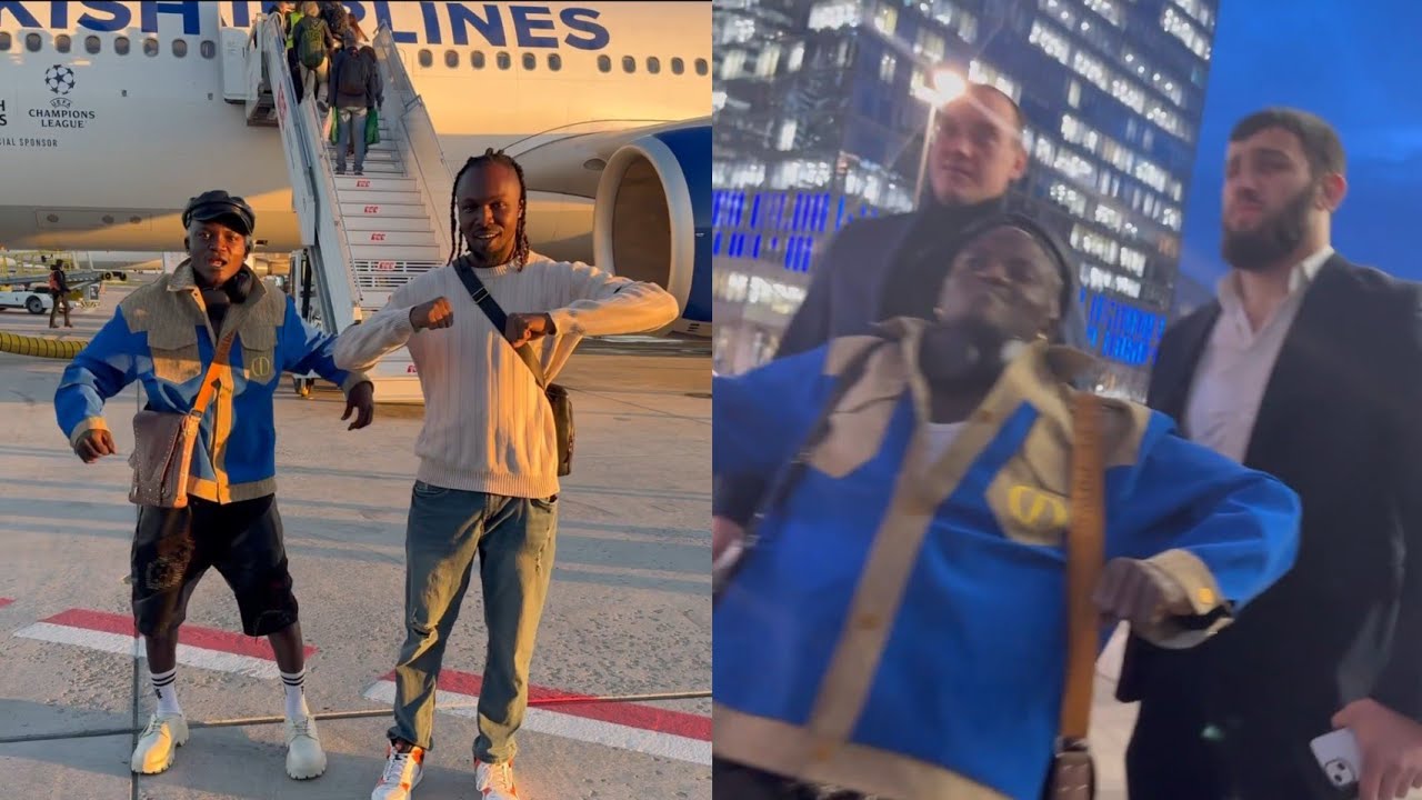 MOMENT PORTABLE CANNOT HIDE HIS JOY AS HE ARRIVES RUSSIA WITH WHITE MEN AS HIS SECURITY & CAMERA MAN