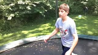 Adam flipping on trampoline