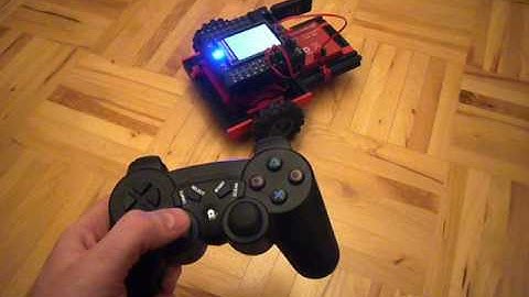 Fischertechnik TXT robot controlled via wireless USB gamepad