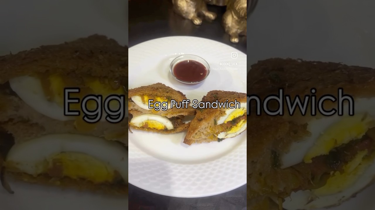 Egg Puff SandwichFlaky on the outside, soft and spicy on the inside!