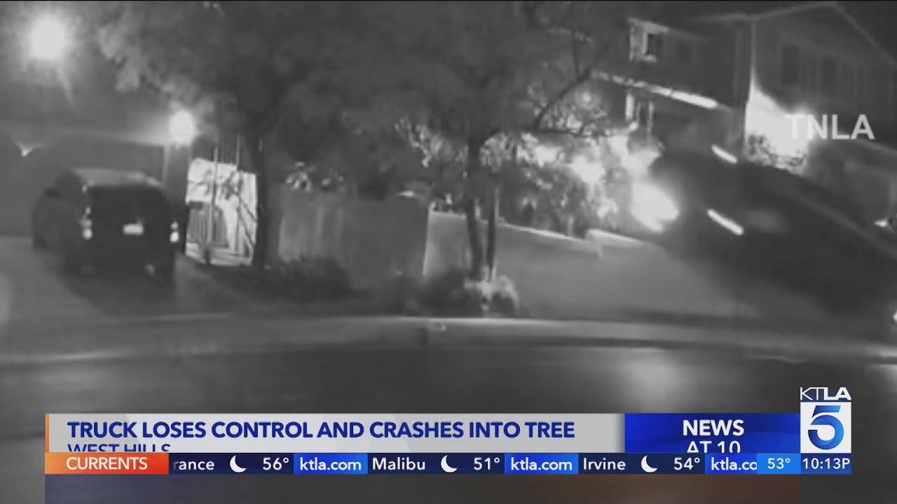 Driver loses control, crashes truck into tree - YouTube